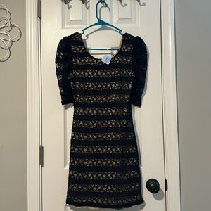 Lace dress with nude under dress